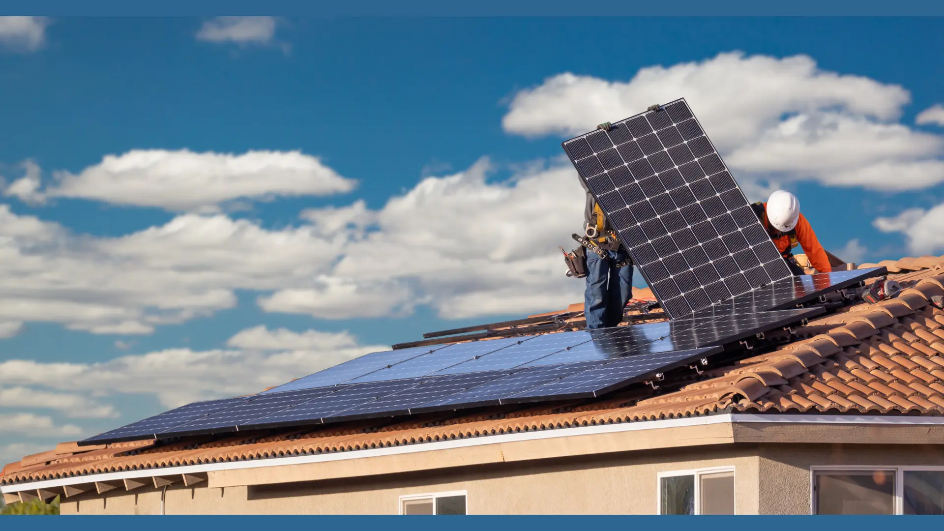 Solar panels installed across a large roof area