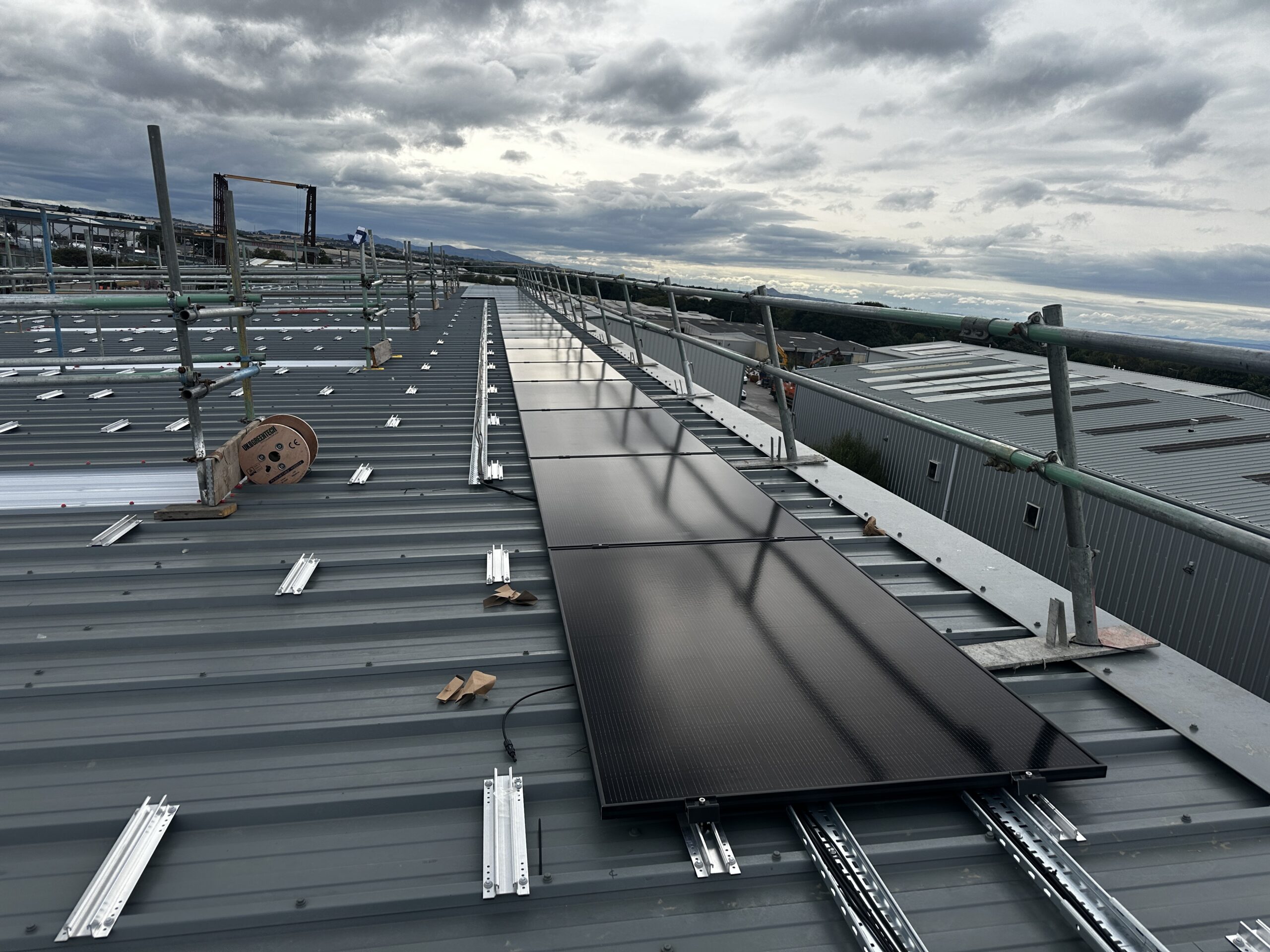 Commercial solar panels and mounting system on an industrial roof